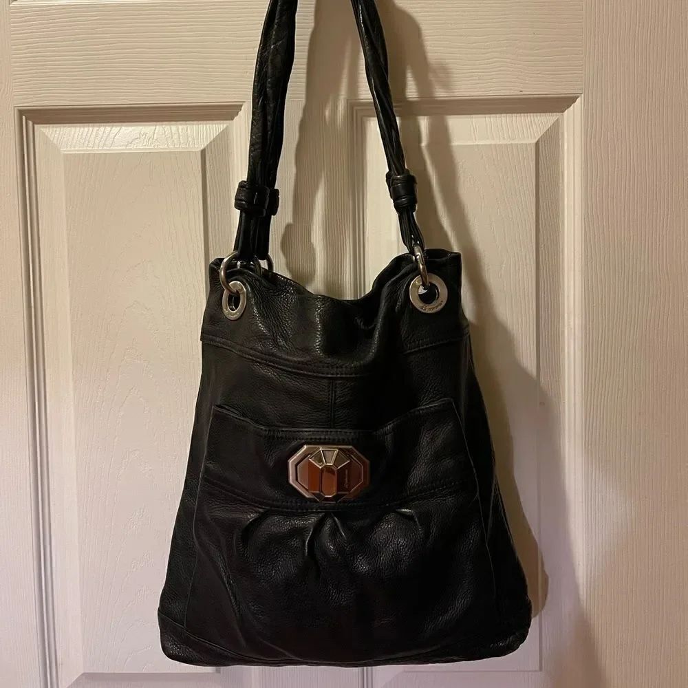 B Makowsky leather black medium shoulder bag with silver tone hardwares.